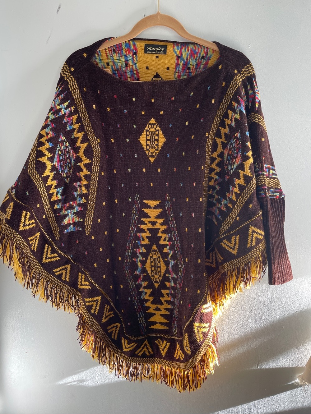 This is a Marqlop handmade Southwestern-style poncho